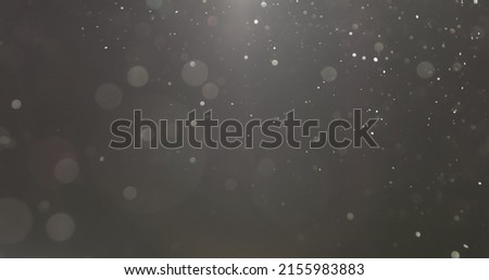 Bokeh particles glitter awards dust gradient abstract background closeup Royalty-Free Stock Photo #2155983883