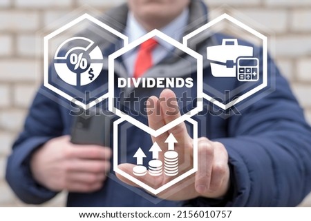 Concept of dividends. Dividend growth or increase dividend. A dividend is a payment made by a corporation to its shareholders as a distribution of profits. Saving money. Dividend tax. Royalty-Free Stock Photo #2156010757
