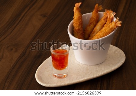 Shrimp Tempura with Bittersweet Sauce, a famous Asian Appetizer, Braga, Portugal. Royalty-Free Stock Photo #2156026399