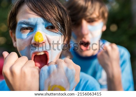 Friends soccer fans shouting a goal. Royalty-Free Stock Photo #2156063415