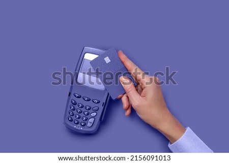 Contactless payment by credit card. POS terminal NFC payment. Concept of how to choose payment method for shopping in a store. Royalty-Free Stock Photo #2156091013