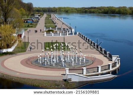 Landscape with river flooding, forest and embankment in the city in spring. Rivers of Belarus. the city of Gomel. Europe.