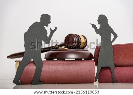 couple a man and a woman quarrel. the concept of emotional aggression between husband and wife. problems in the relationship. silhouette people shout at each other.