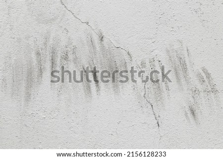 White or gray old concrete wall cement texture with abstract dirty grey background pattern.