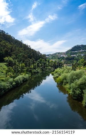 View from the bridge over Mondego river in Penacova - Portugal. Royalty-Free Stock Photo #2156154119