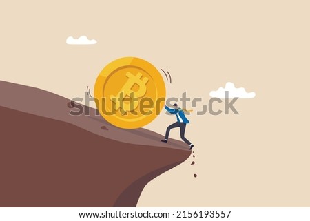 Pushing Bitcoin prevent from price falling down, cryptocurrency risk, fluctuation or volatility, crypto crisis or panic sales concept, businessman investor push Bitcoin from falling down the cliff. Royalty-Free Stock Photo #2156193557