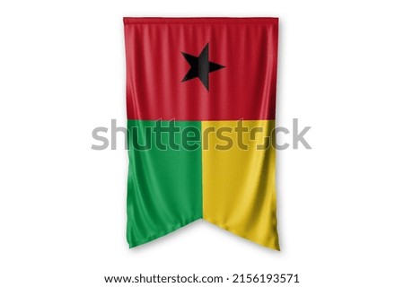 Guines Bissau flag hang on a white wall background. - image.