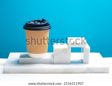 hot coffee paper cup arranged on the marble block, equipment for hot coffee ready to drink
