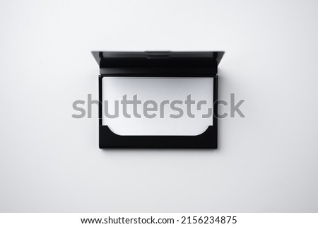 minimal, abstract, template concept with business card and business card case isolated on white background, for mock up, top view layout.