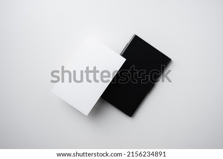minimal, abstract, template concept with business card and business card case isolated on white background, for mock up, top view layout.