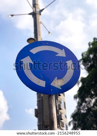 Traffic Sign Circulation Site, White Arrows On Blue Background