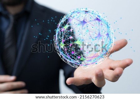 A businessman holding a bubble of network connection dots and lines on his palm