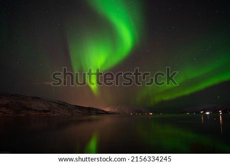 Northern Lights dancing over Kvalsundet by Tromsø