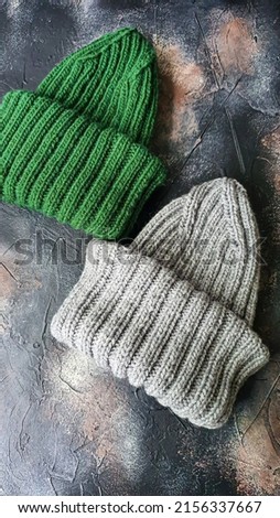 Handmade balaclava with Ukrainian symbols. Knitted from gray and green threads. Warms, reliably saves from the cold. Crochet and knitting.