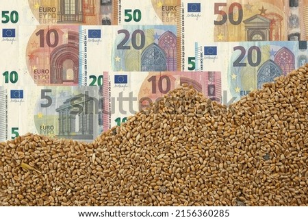 Grain chart and euro bills.Climate change is heating up grain prices. Drought in the two top European production countries, France and Germany, is driving prices higher and higher.