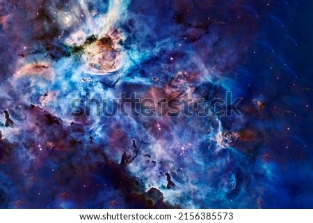 Blue space nebula with stars. Elements of this image furnished by NASA. High quality photo