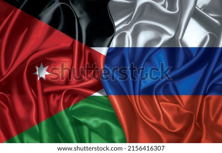 Jordan and Russia two folded silk flags together
