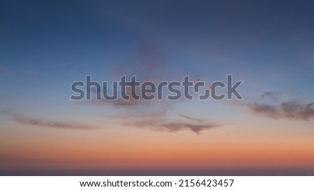 Atmospheric cloud great for nature desktop background use or sky replacement for real estate photography with the young moon and abstract shape.