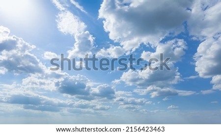 Atmospheric bright cloud great for nature desktop background use or sky replacement for real estate photography with the sunlight and abstract shape.