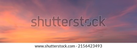 Atmospheric pastel cloud panorama great for nature desktop background use or sky replacement for real estate photography with the sunlight and abstract shape.