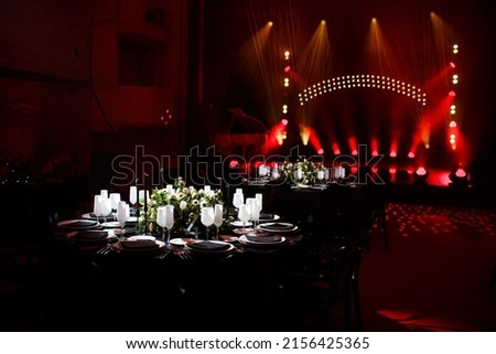 Table set for wedding or another catered event dinner. Royalty-Free Stock Photo #2156425365