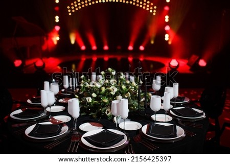 Table set for wedding or another catered event dinner. Royalty-Free Stock Photo #2156425397