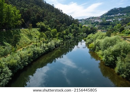 View from the bridge over Mondego river in Penacova - Portugal. Royalty-Free Stock Photo #2156445805