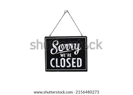 Sorry we're closed sign. wooden image hanging isolated on white background,With clipping path