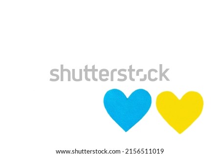Heart in the colors of the Ukrainian flag isolated on white background. Stop the war concept. Flat lay, a place for text, mockup, template, top view