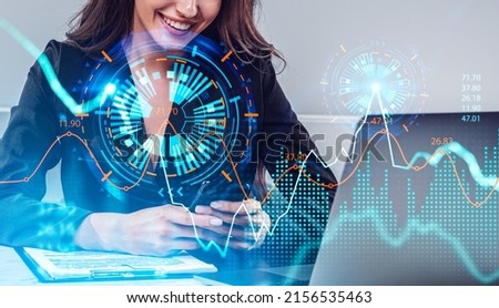 Businesswoman in formal wear is working on smartphone and laptop with digital interface with financial graph, forex pie diagram. Office in background. Concept of trading on stock market, investment