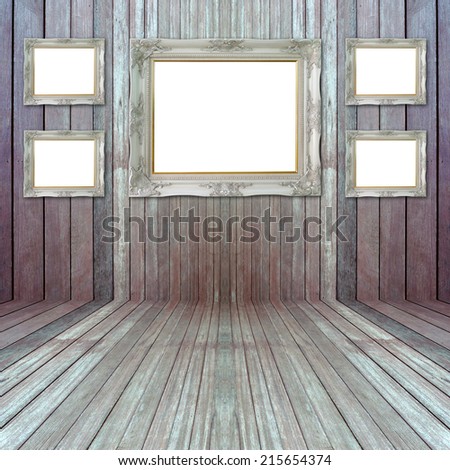 Vintage picture frame isolated on wall background.