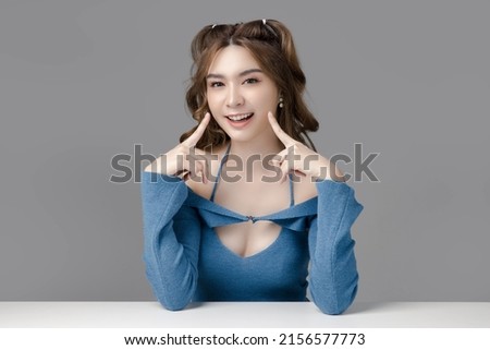 Portrait of beautiful Asian women are cool and confident in casual clothes over gray background. People lifestyle concept. Mock up copy space.  Fashion model. attractive elegant woman.