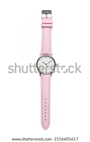 Wristwatch with pink strap isolated on white background. Top view