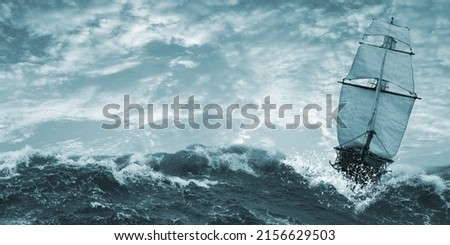 Old ghost ship sailing in a stormy sea. Royalty-Free Stock Photo #2156629503