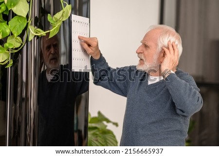 Patient training his impaired memory after a stroke Royalty-Free Stock Photo #2156665937