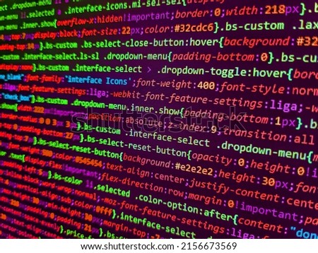Data encryption security code on a computer display. Computer code on laptop (web developing). Developer working on program codes. Abstract source code background