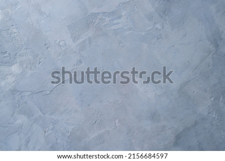 the texture of the gray old cement wall background of gray plaster wall