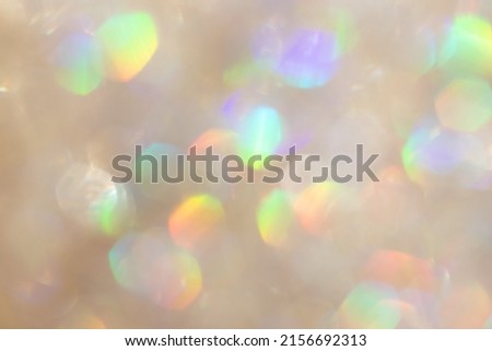 Abstract defocused pastel background with shining glitter.Good as overlay layer.