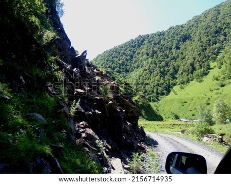 Beautiful high Caucasus mountains in Khevsureti region of Georgia close to Ardoti village. Driving in Pshav-Khevsureti National Park by jeep.