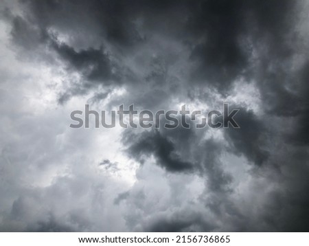 Full frame of dust overcast sky before to raining.Natural gloomy sky weather background. Dramatic storm cloudy and dark sky. Dark clouds sky.
