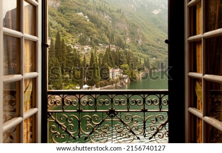 Window view to Lake Como in Italy