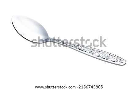 Stainless steel coffee spoon side views isolated on white background, clipping path suitable for design, spoon vintage pattern style.