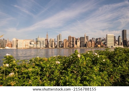 Midtown Manhattan skyline at sunrise, seen from Long Island City, Queens, New York.