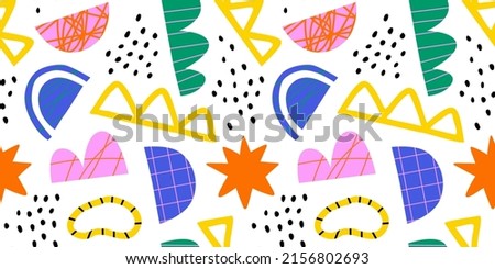 Abstract organic shape seamless pattern with colorful geometric doodles. Flat cartoon background, simple random shapes in bright childish colors. 