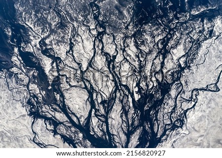 Coal sludge pond Venuse. Landscape damaged by coal mining. Aerial view of fossil fuels produced in the Czech Republic. Royalty-Free Stock Photo #2156820927