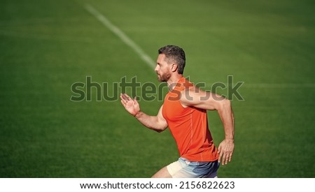 sporty runner. stamina. sport and endurance. outdoor stadium sprint. physical training. Royalty-Free Stock Photo #2156822623