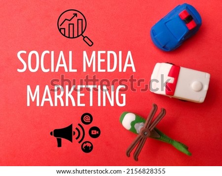 A design of vehicle toys and icons with text social media markting on a red background 