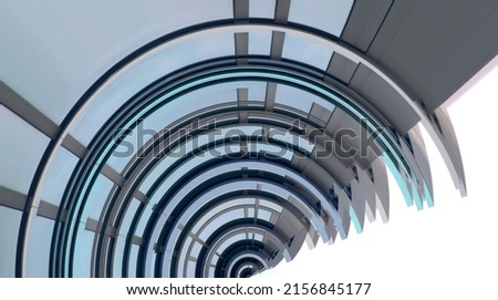 Partially isolated colorized photo of roof structure. Abstract modern architecture. Fragment of hi-tech building. Round dome shape. Commercial estate. Minimal background. Geometric pattern of curves.