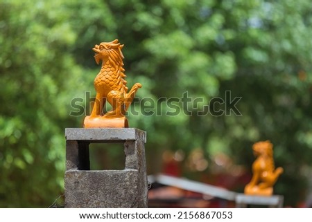 the Statue of the Dragon. Temple outside the city in Kunming in the summer