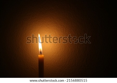 The candlelight in the darkroom, black background